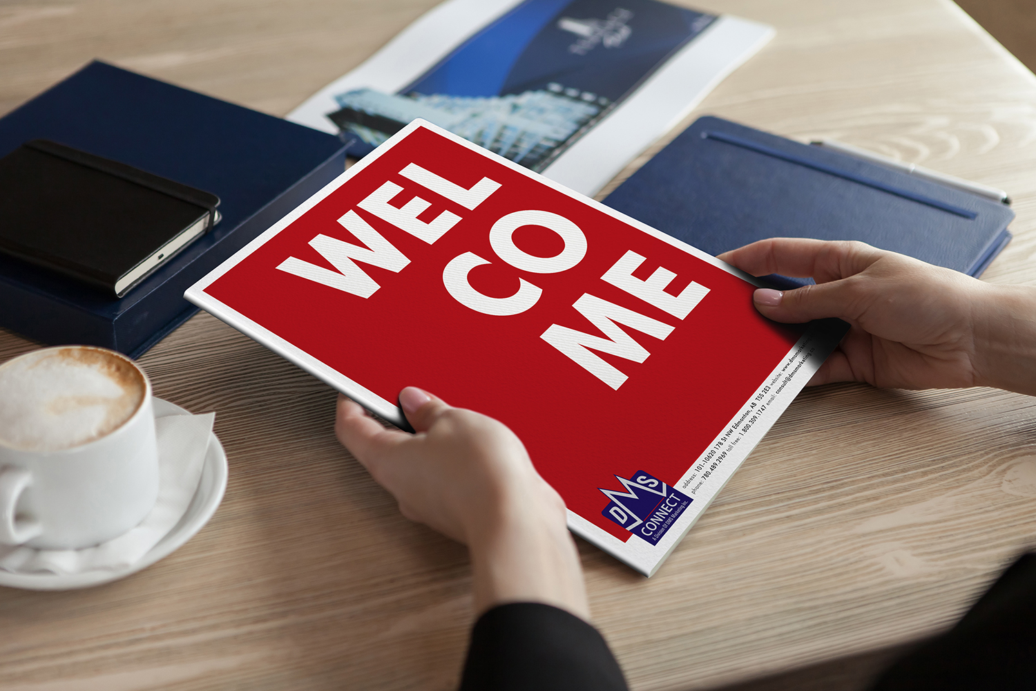 Woman holding welcome package.