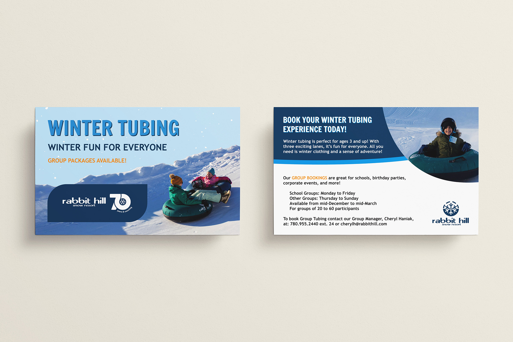 70th Anniversary branded winter tubing flat card.